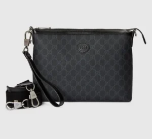 Interlocking Double G Postman Bag in black GG Supreme canvas with leather accents and detachable strap, showcasing luxury design and craftsmanship.