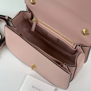 Gucci Sylvie small shoulder bag pink leather with gold-tone hardware and zippered inner pocket