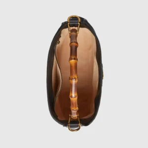 Gucci Diana Collection Medium Shoulder Bag interior view showcasing bamboo handle and leather craftsmanship.