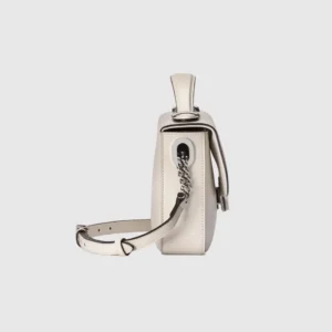 Gucci Petite GG Series Small Shoulder Bag in white leather showcasing the double-G logo and adjustable strap, emphasizing modern design elements.