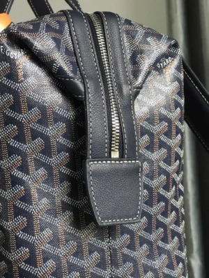 Goyard Cisalpin Backpack close-up showcasing structured zipper closure and Goyardine canvas pattern, emphasizing urban adventurer design and quality materials.