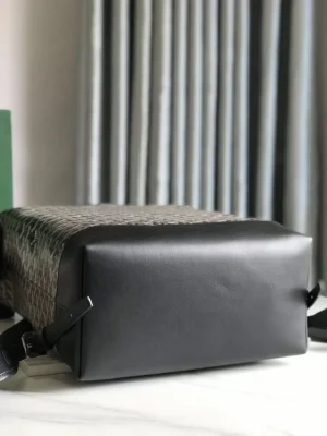 Goyard Cisalpin Backpack featuring a structured design with Goyardine canvas and calf leather, showcasing the bottom view and adjustable shoulder straps, ideal for urban adventurers.