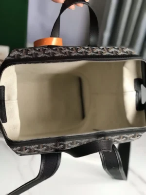 Goyard Cisalpin Backpack interior view showcasing spacious design, zipper closure, and signature Goyardine canvas pattern.