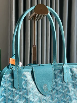 Goyard Belvedere II Tote in blue leather, showcasing intricate pattern and detailing, ideal for luxury accessory enthusiasts.
