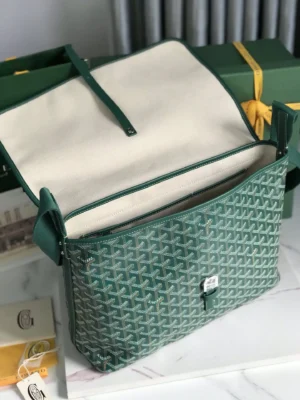 Goyard Citadin Mailman Bag in green with open flap, showcasing interior and distinctive pattern, highlighting versatility as a briefcase or crossbody bag.