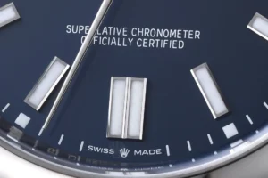 Rolex Oyster Perpetual blue dial stainless steel watch with luminescent hour markers and silver hands