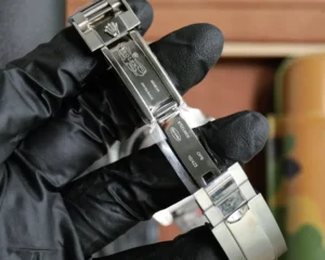 Rolex Oyster Perpetual stainless steel watch clasp with engraved logo and Swiss made markings