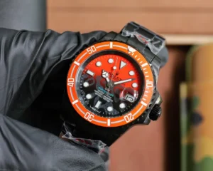 Rolex Submariner black dial orange bezel black stainless steel watch