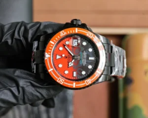Rolex Submariner black dial orange bezel black stainless steel watch with date window