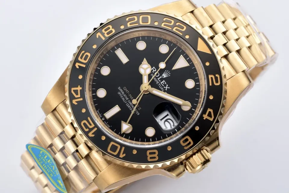 Rolex GMT-Master II black dial ceramic bezel yellow gold case watch