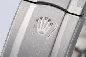 Rolex watch stainless steel clasp with engraved crown logo metal accessory detail