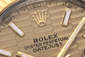 Rolex Oyster Perpetual Datejust honeycomb dial gold bezel stainless steel watch
