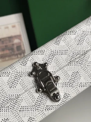 Goyard clasp white canvas accessory with black chevron pattern and silver hardware detail