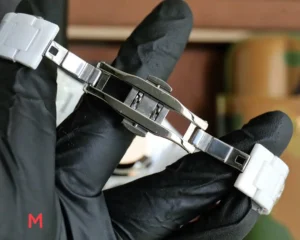 Chanel J12 ceramic watch white ceramic bracelet stainless steel clasp close-up