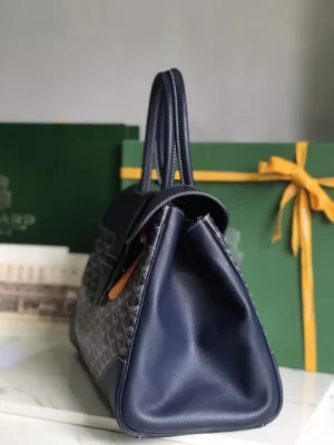 Goyard Saigon Tote Bag in navy with distinctive geometric pattern, showcasing elegant design and practicality, set against a backdrop of gift boxes.