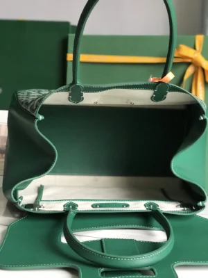 Goyard Saigon Tote bag in green, showcasing spacious interior and elegant design, with luxury branding elements visible.