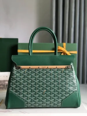 Goyard Saigon Tote bag in green leather with signature pattern, elegant design, and stylish hardware, displayed against a neutral background with gift boxes.