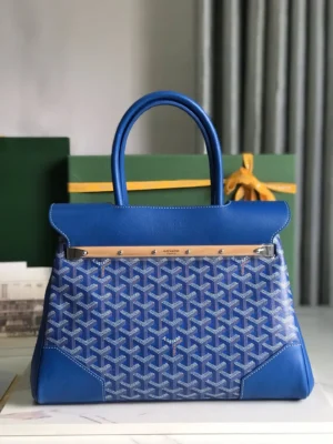Goyard Saigon Tote bag in vibrant blue, featuring signature pattern, elegant design, and practical structure, displayed against a minimalist background.