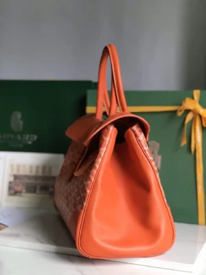 Goyard Saigon 35 medium orange canvas leather tote bag with signature chevron pattern