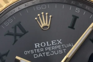 Rolex Oyster Perpetual Datejust black dial gold bezel gold case watch