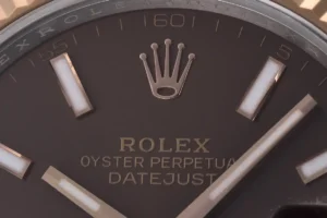 Rolex Datejust brown dial gold bezel stainless steel watch close-up dial markers
