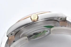 Rolex Datejust 126331 black dial rose gold fluted bezel stainless steel watch side view showing crown emblem