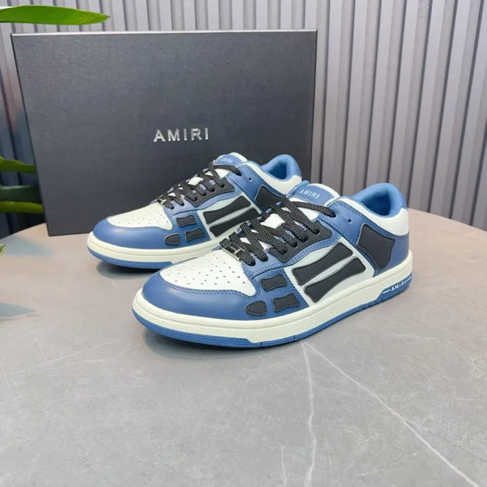 Amiri Skel Top Low white blue black leather sneakers with perforated toe and contrast panels