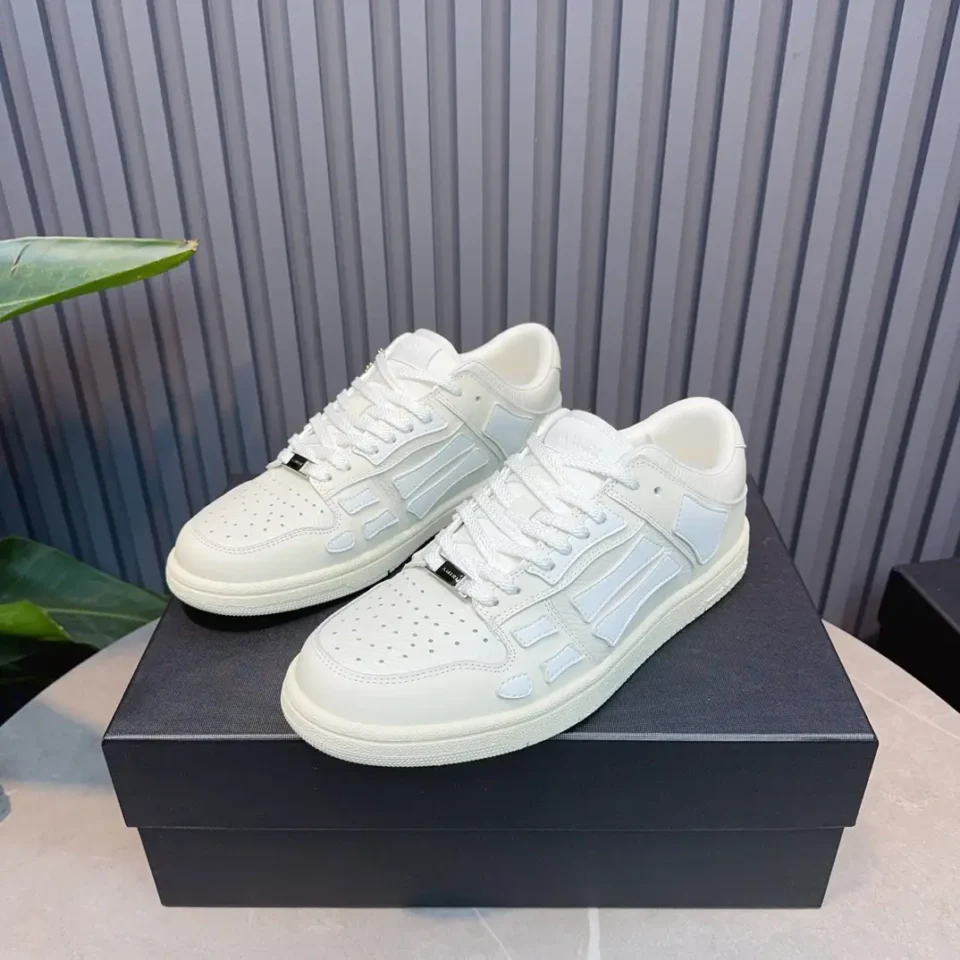 Nike Air Jordan 1 Low OG white colorway leather sneakers with perforated toe box and retro design