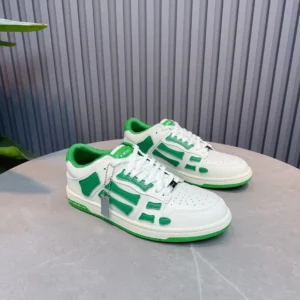 Amiri Skel Top Low green white leather sneakers with perforated toe and contrast rubber sole