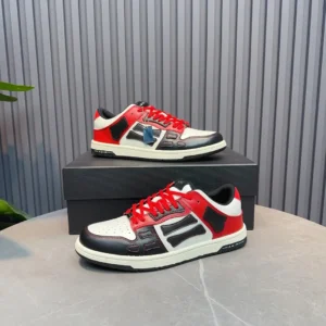 Amiri Low Top Sneaker red black white leather casual shoes with contrast stitching and rubber sole