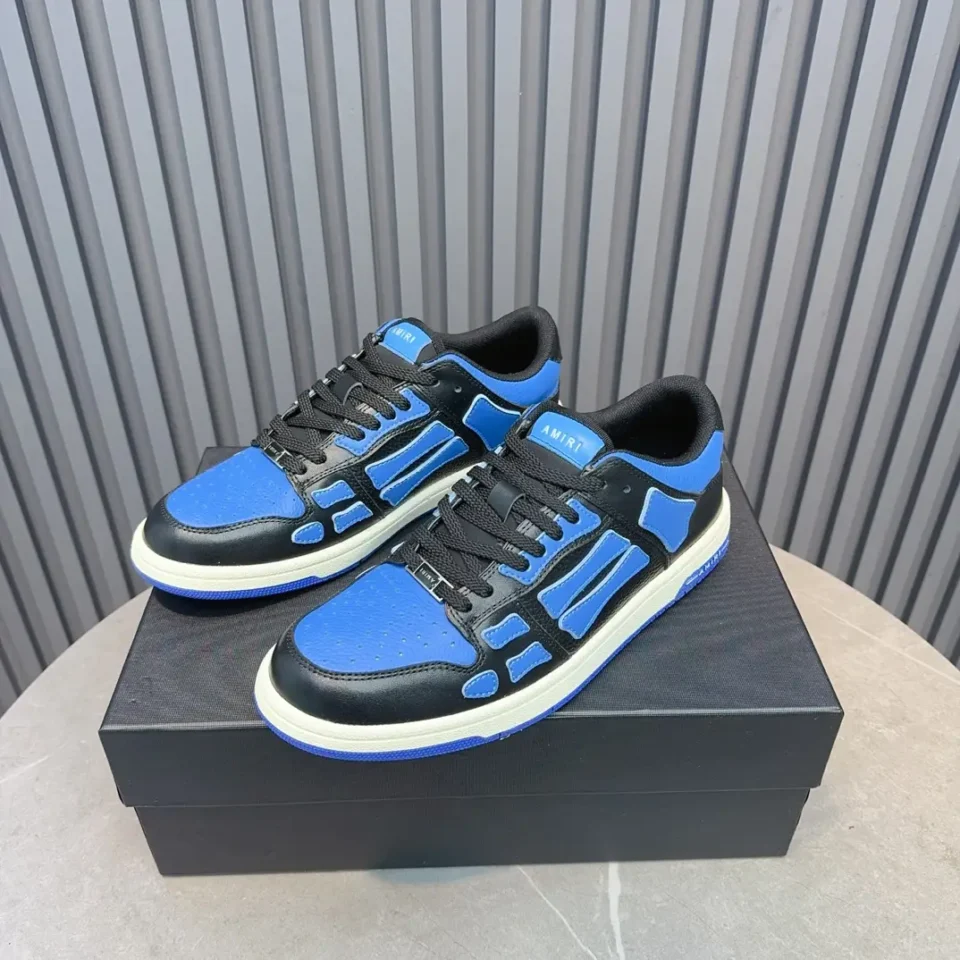 Amiri Skel Top Low vintage blue black leather sneakers with cream sole and black laces