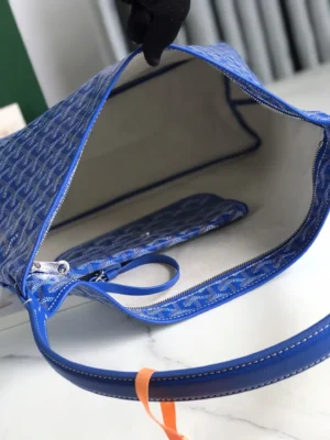 Goyard Hobo Boh è Me Stray Bag interior view showcasing blue patterned fabric, zipper pocket, and shoulder strap details.