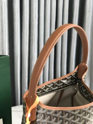 Goyard Hobo Boh è Me Stray Bag underarm view showcasing brown leather strap and interior lining, emphasizing luxury replica handbag features.