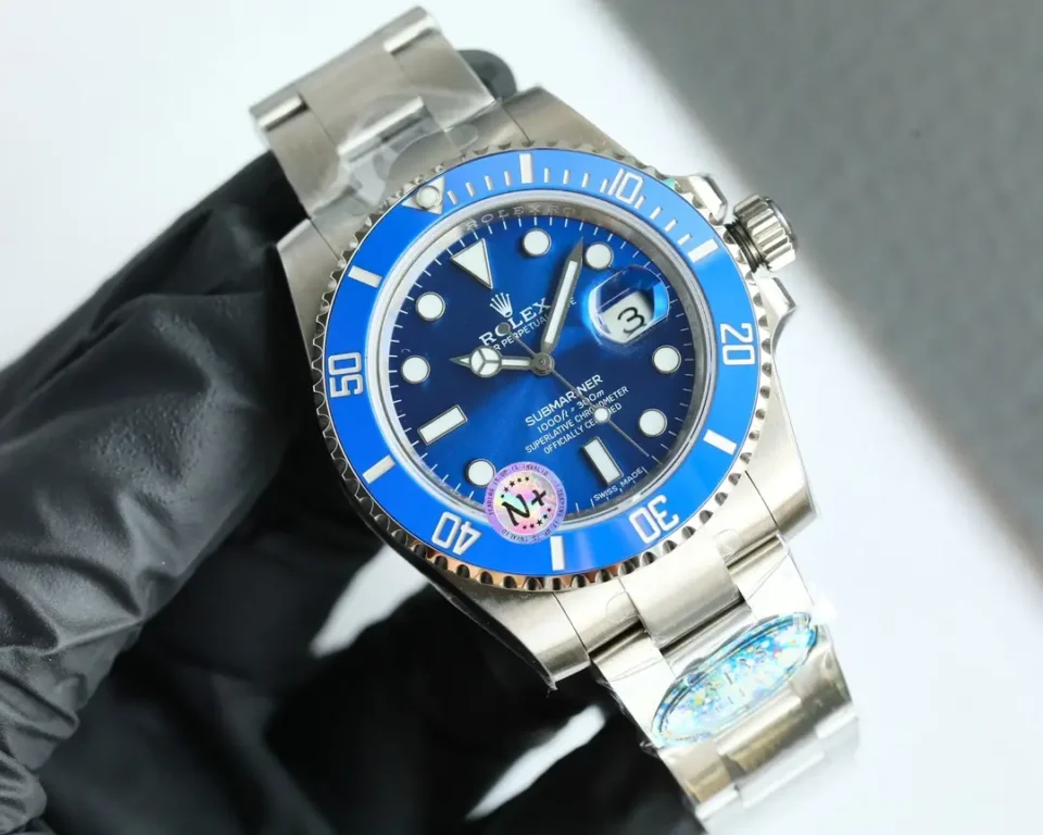 Rolex Submariner blue dial ceramic bezel stainless steel watch with date display and luminescent markers
