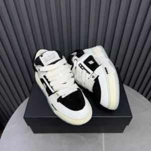 Amiri Skel Top Low black white leather sneakers with mesh and script label detail