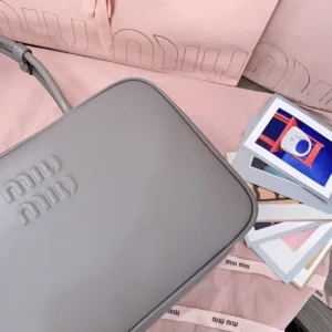 Miu Miu rectangular shoulder bag medium gray smooth leather embossed logo