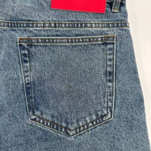 SP5DER White Logo Blue Cowboy Shorts back pocket detail with tag.