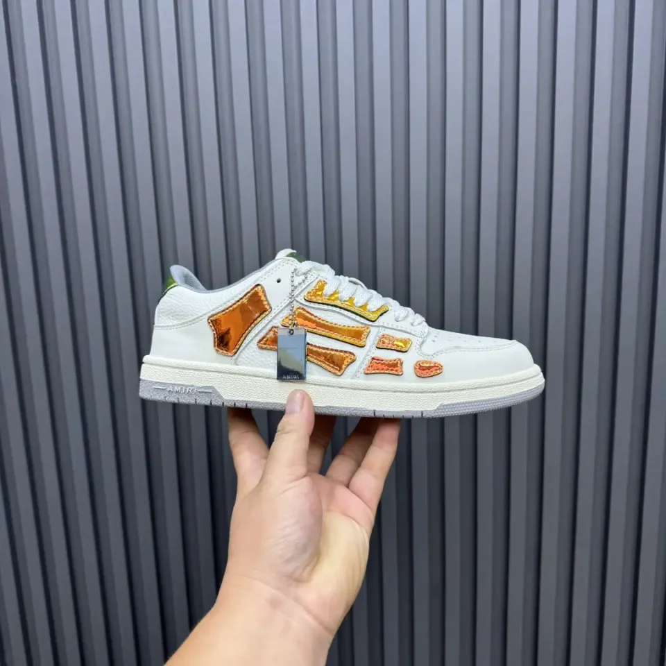 Amiri Skel Top low white orange metallic leather sneakers with silver hangtag detail