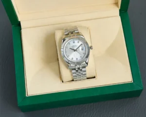 Rolex Datejust silver dial fluted bezel stainless steel case and bracelet watch in green box