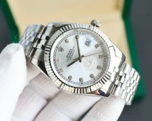 Rolex Datejust white dial fluted bezel stainless steel case and bracelet watch with diamond markers