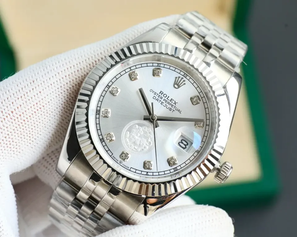 Rolex Datejust silver dial fluted bezel stainless steel case and bracelet watch with diamond markers