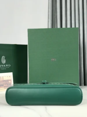 Goyard Citadin Mailman Bag in smooth green leather with packaging, showcasing luxury and elegance.