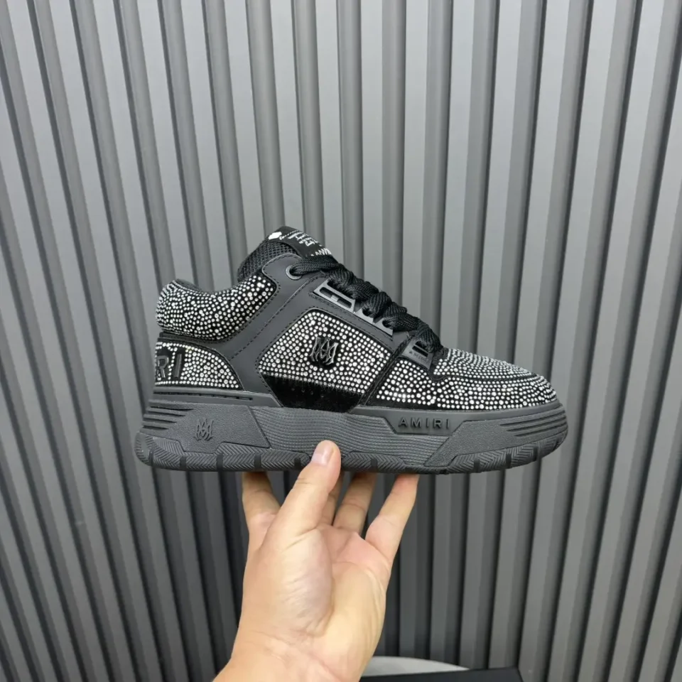 Amiri MC01 black studded leather sneakers with black rubber sole and lace-up design