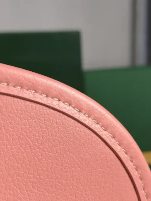Close-up of pink leather detailing with stitching, highlighting the quality craftsmanship of the Goyard Belvedere II Sliver crossbody shoulder purse.
