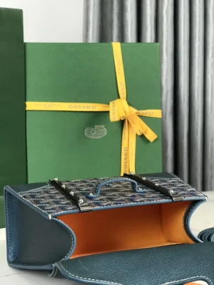 Pearl Green Goyard Sa ï gon mini bag with original packaging and box, featuring a distinctive interior and elegant design, showcasing craftsmanship and trendy appeal.