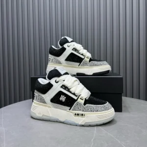 Amiri Skel Top Sneakers black and white colorway mixed mesh and leather material with oversized laces and logo detailing