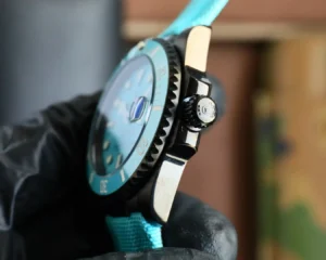 Rolex Submariner 116610LN turquoise dial ceramic bezel stainless steel watch with turquoise fabric strap