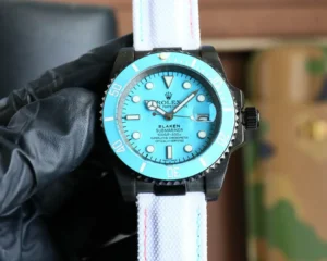Rolex Submariner Blaken turquoise dial ceramic bezel black stainless steel watch with white fabric strap
