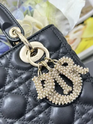 Dior Lady Dior bag small black quilted leather gold-tone pearl embellished charm