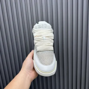 Unknown brand white sneakers with ribbed wide laces and sparkling mesh material upper